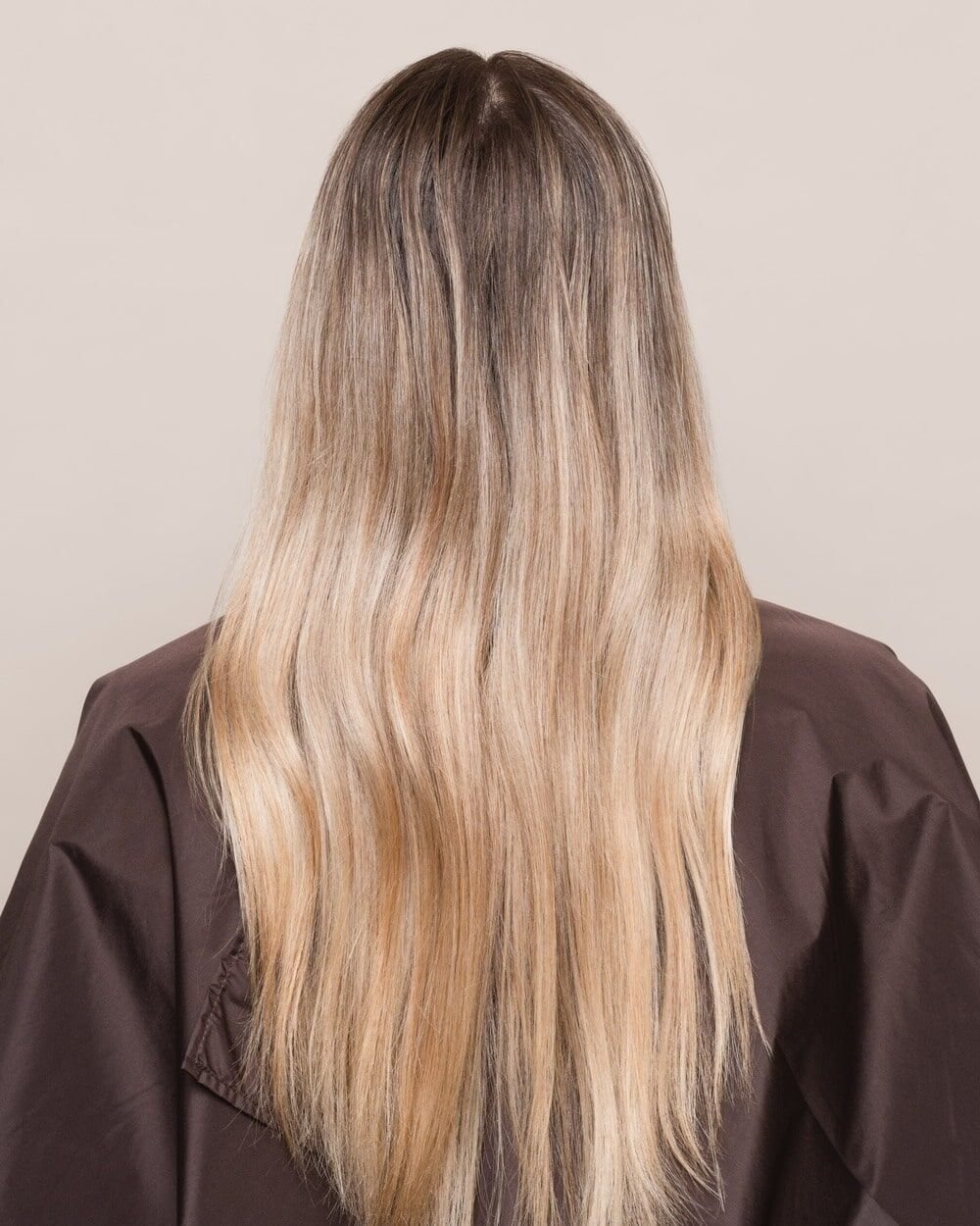 The same hair before treatment: dry, dull lengths with flat, thinned-out ends